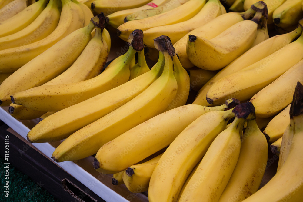 bunch of bananas at market stall