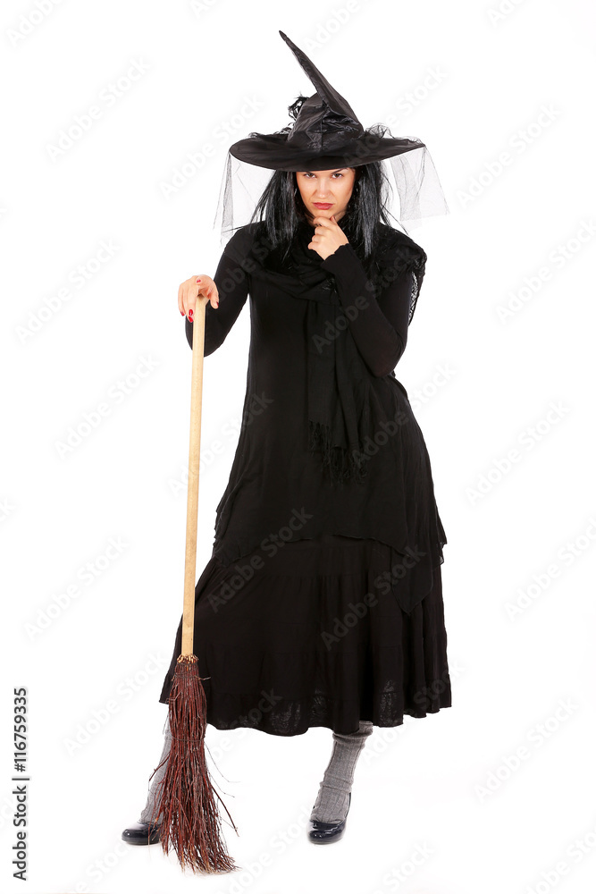 young black dressed witch with broom, isolated on white background
