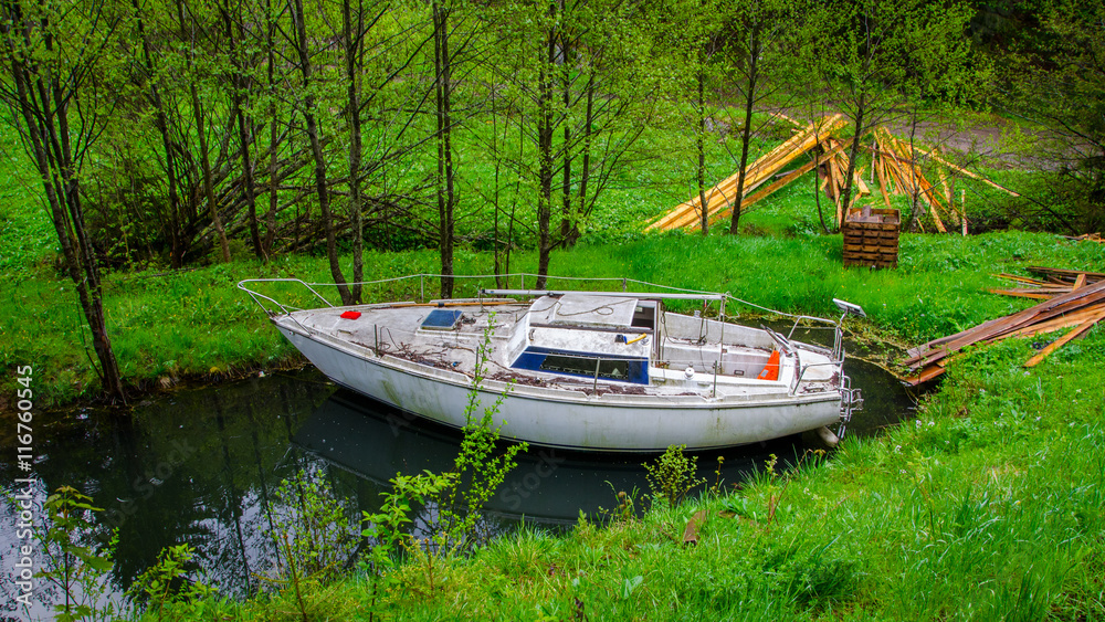 Old boat in the forest of Vosges mountains, Alsace Old boat in the forest of Vosges mountains, Alsace