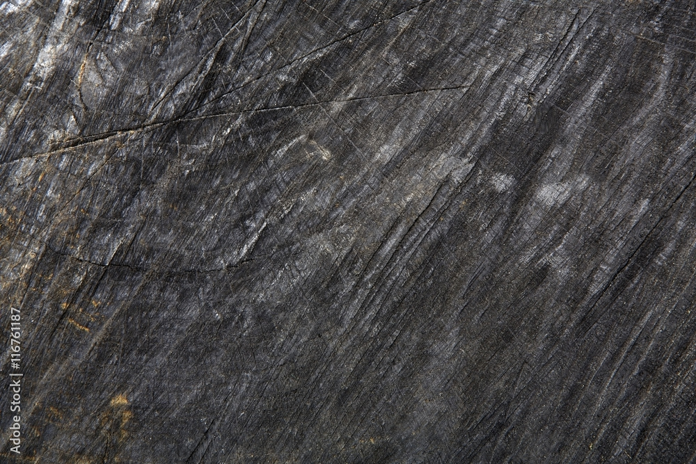 Dark gray or black wood texture closeup background Dark gray or black wood texture closeup background