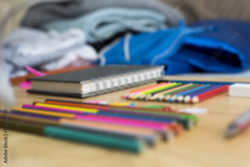 Colorfully Office and art stationery objects on wood table