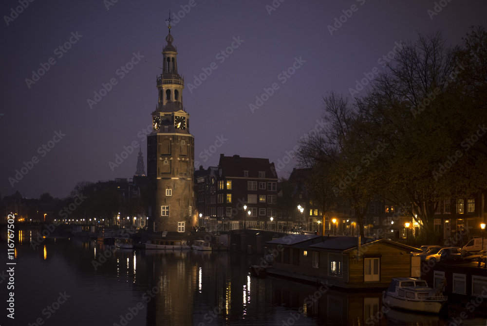 Clock Tower. Public Building in Amsterdam at Night