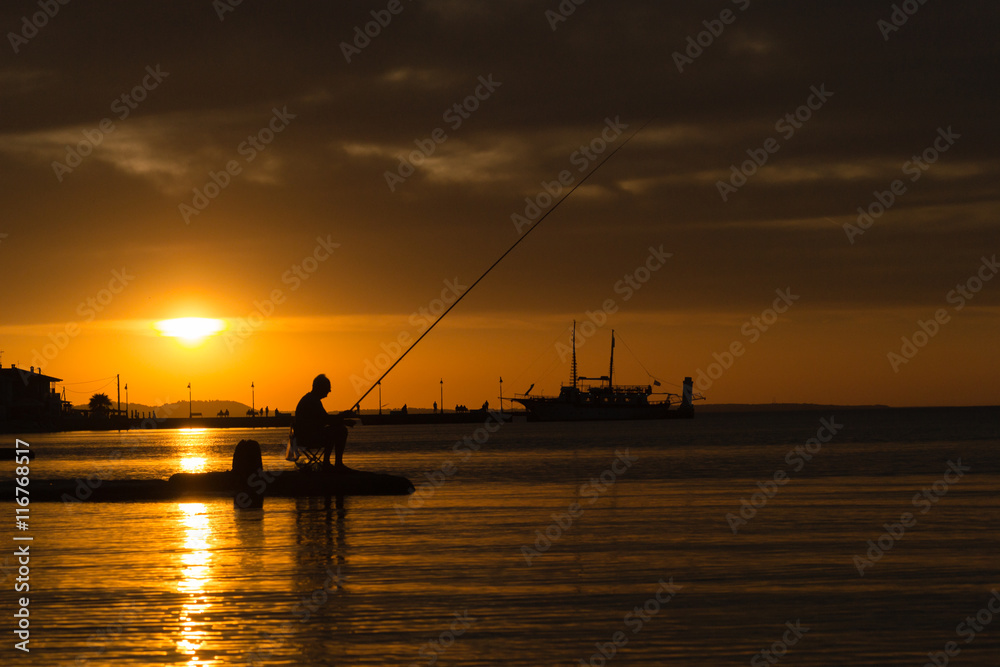 Fishermen at sunset