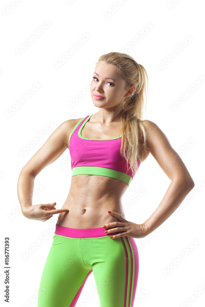 Portrait of attractive smile teenage girl pointing finger to stomach, isolated over white background Portrait of attractive smile teenage girl pointing finger to stomach, isolated over white background