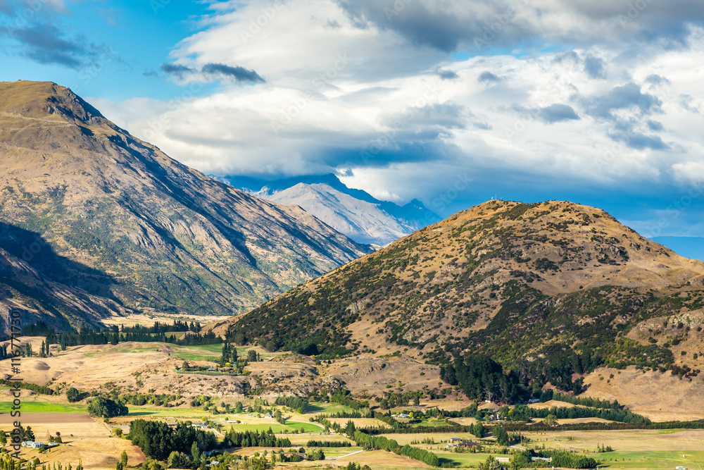 View from Crown Range Lookout, South Island, New Zealand, showing mountains overlooking a valley.