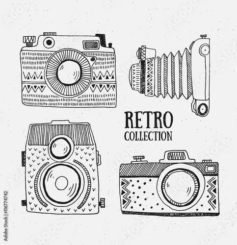 Retro photo cameras set. Vector illustration. Vintage cameras with ornaments. Hipster vector set.