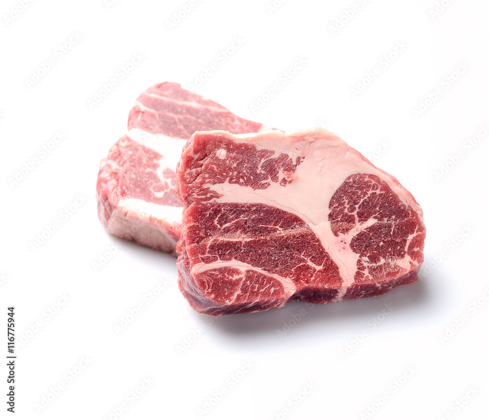 Fototapeta premium two pieces of marble raw beef on a white background