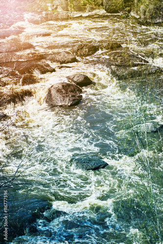 Mountain stream river with stones
