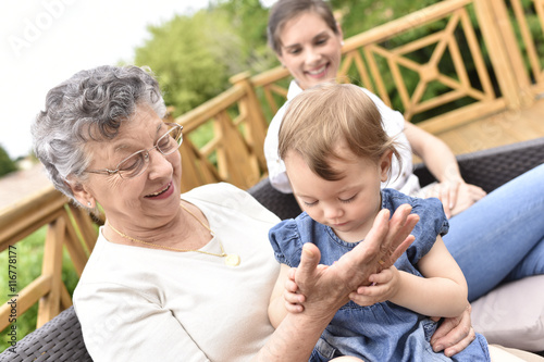 Granddaughter visiting grand-parents in senior home