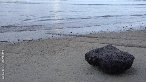 Evening of The 75 Million Years Old Fossil Shell Beach Cemetery, Susan Hoi, Shelly Limestone in Krabi province. Famous Thailand Tourist Landmark.  photo