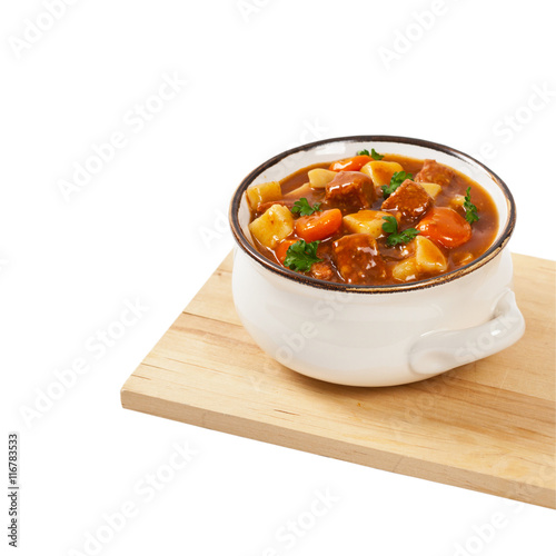 Slow Cooker Beef Stew Isolated on white. Selective focus.