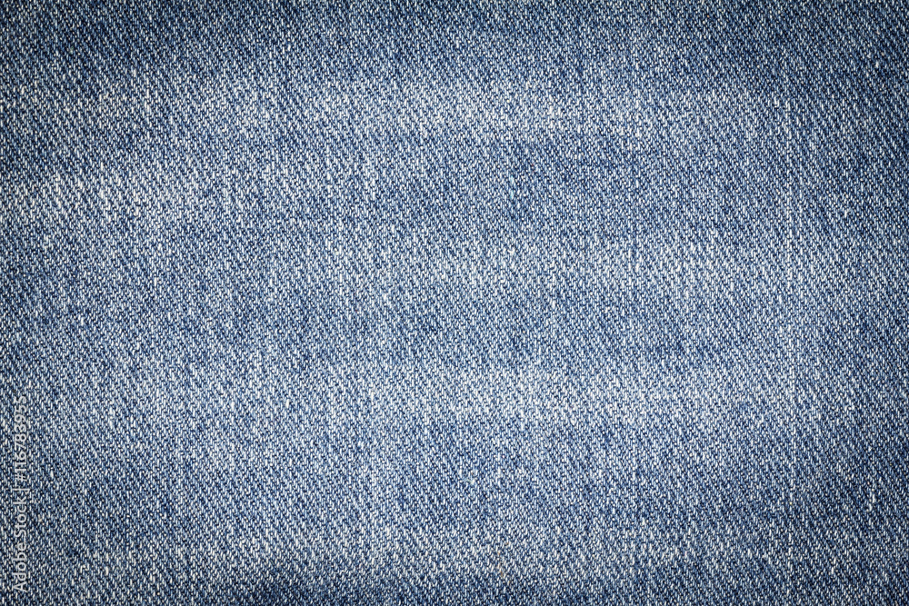 Denim jeans texture or denim jeans background of fashion jeans design with copy space for text or image. Dark edged. Denim jeans texture or denim jeans background of fashion jeans design with copy space for text or image. Dark edged.