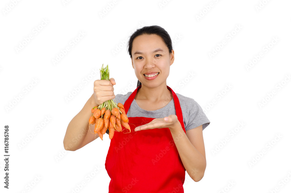 Happy woman holding carrot ready to cooking,isolated on white background Happy woman holding carrot ready to cooking,isolated on white background