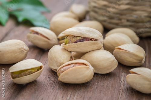 Pistachios on wooden table