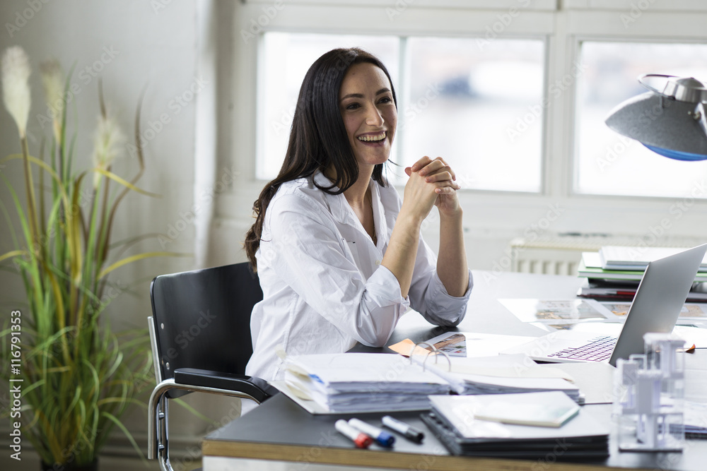 Businesswoman working in office Businesswoman working in office