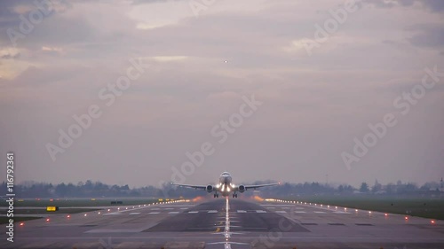 airplane taking off passing over head  at bologna airport,tracking shot,bologna airport 