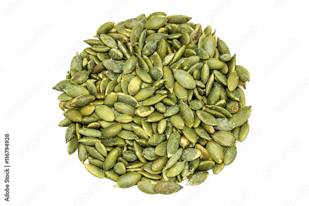 Pumpkin seeds on a white background. Pumpkin seeds on a white background.