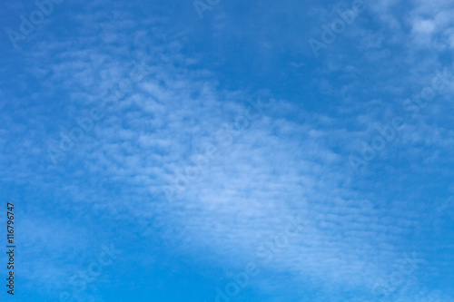 White clouds on a blue sky. Selective focus