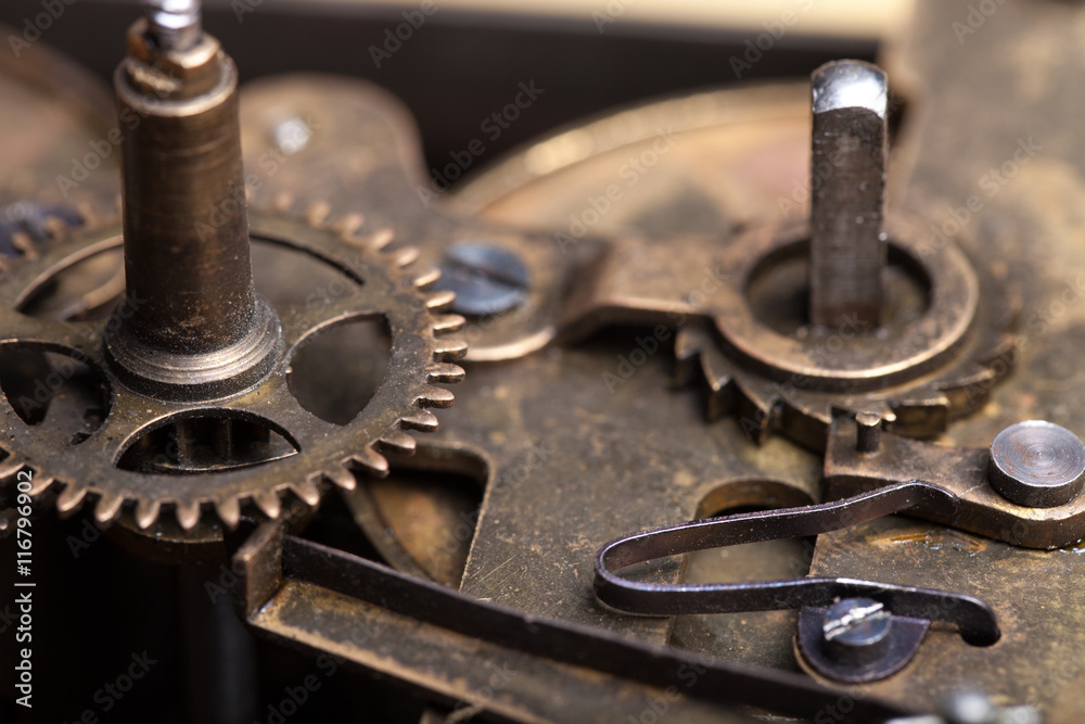 Old clockwork dirty with dust and lubricating oil. Selective foc Old clockwork dirty with dust and lubricating oil. Selective foc