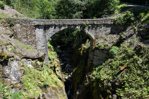 Old roman bridge of Cane on Malvaglia valley photo
