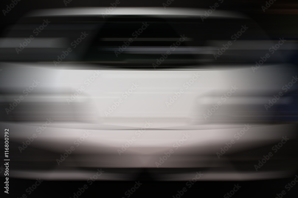 Abstract blurred white car