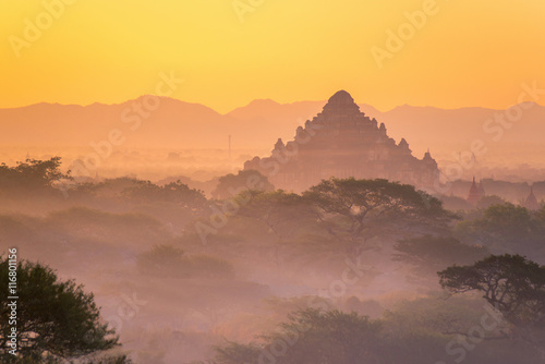beautiful landscape view of sunrise and fog over ancient pagoda