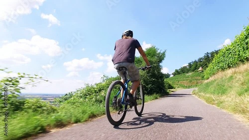 Young man riding his mountain bike