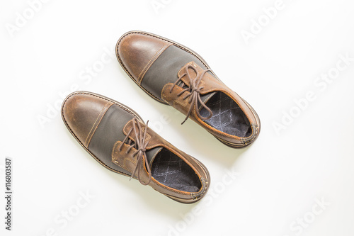 Men's accessories with brown leather shoes with copy space, flat lay, top view background