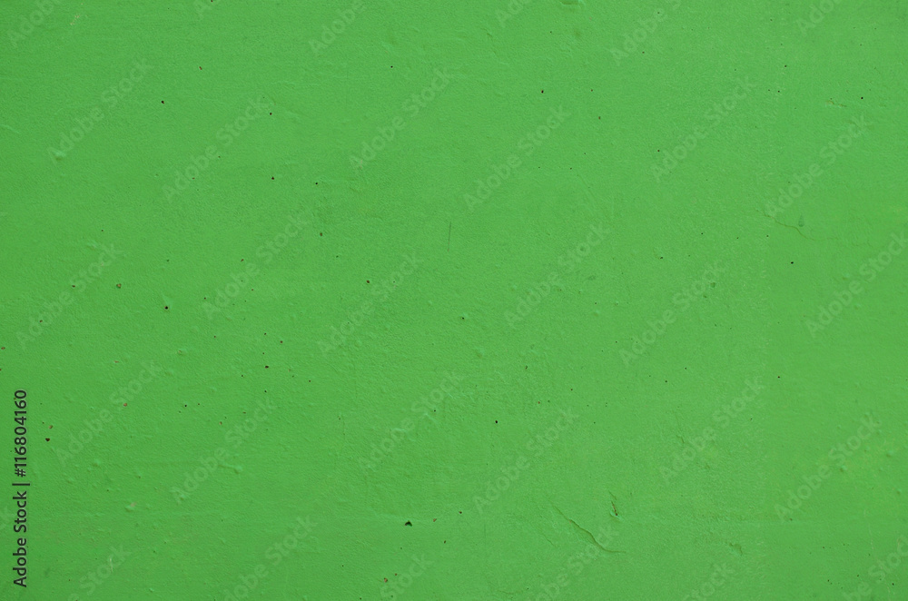 Surface of concrete wall painted in green color Surface of concrete wall painted in green color