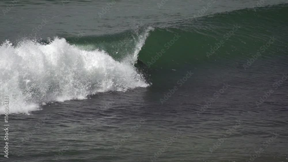 Ocean Waves crashing against a rocky shore. Shot with a high-speed camera. Ocean Waves crashing against a rocky shore. Shot with a high-speed camera.