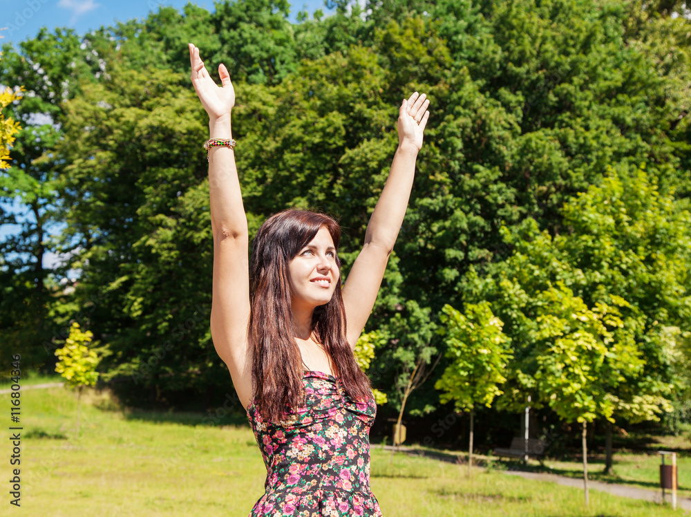 girl enjoing sunny skies in the park girl enjoing sunny skies in the park