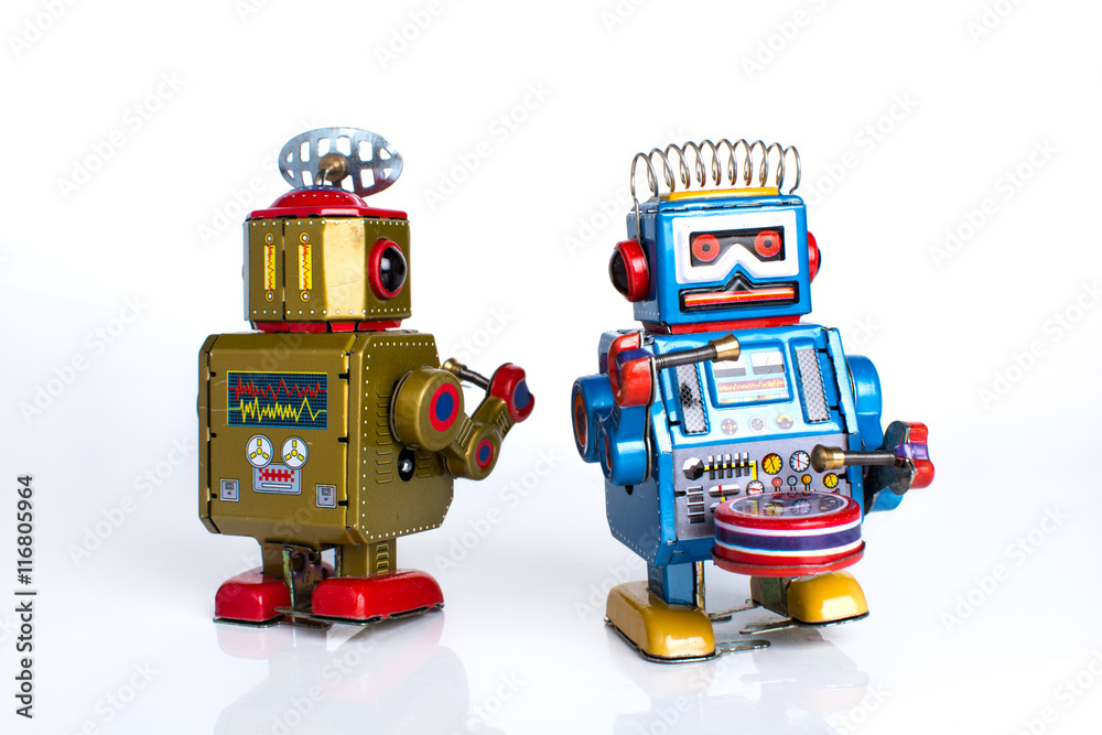 Fototapeta premium old classic robot toys, isolated on white