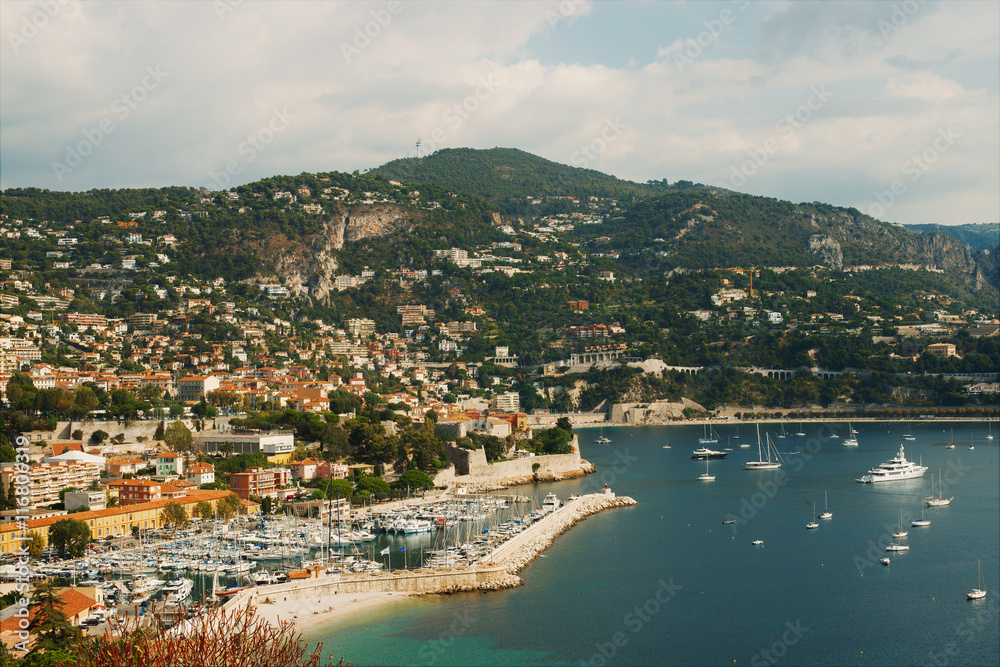 view of luxury resort and bay on sunny day. Villefranche-sur-Mer, Cote d'Azur, french reviera, near Nice and Monaco