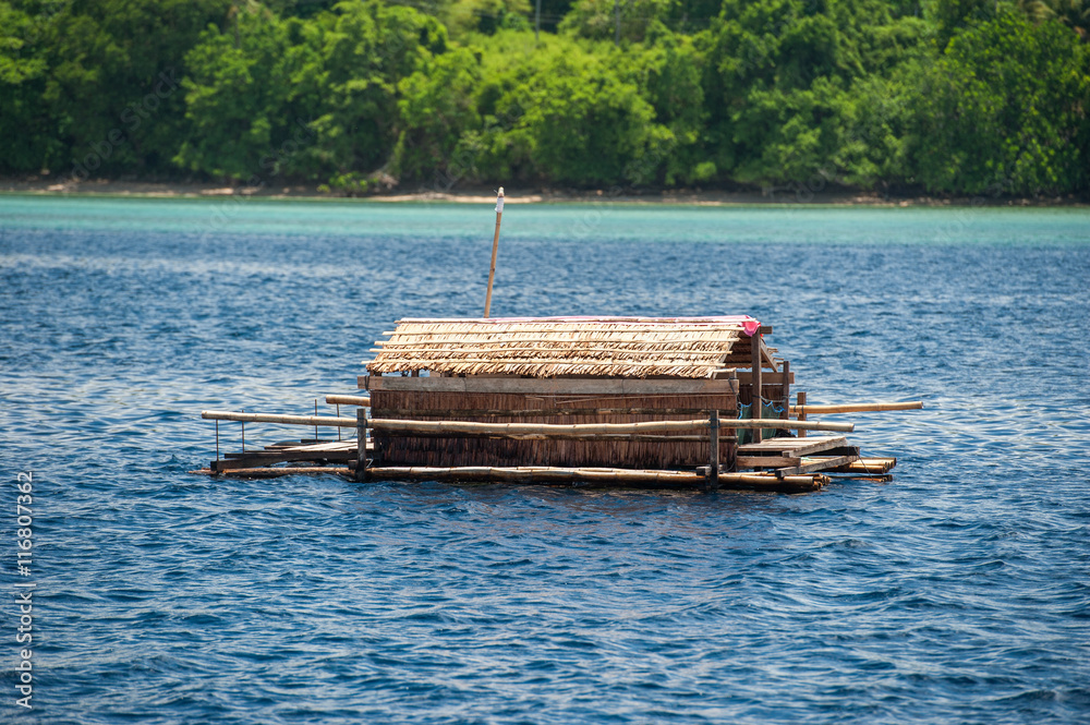 Small wood floating fishing platform in sulawesi indonesia Stock Photo