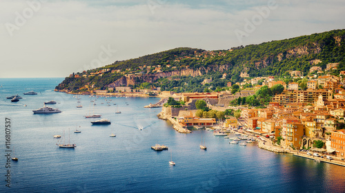 Villefranche-sur-Mer, France - 10 September, 2015: view of luxury resort and bay on sunny day. Villefranche-sur-Mer, french reviera, near Nice and Monaco