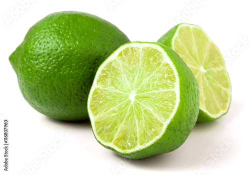 lime with two halves isolated on white background