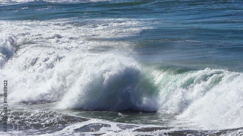 Ocean Waves crashing against a rocky shore. Shot with a high-speed camera. Ocean Waves crashing against a rocky shore. Shot with a high-speed camera.