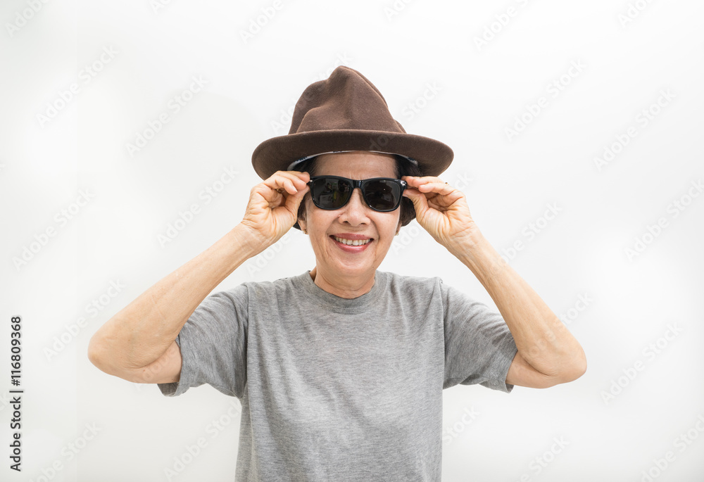 old women wear hat and sunglasses -smailling old women wear hat and sunglasses -smailling