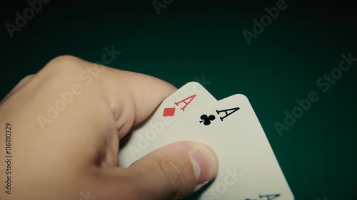 A pair of aces in a hand on the table. Pocker photo