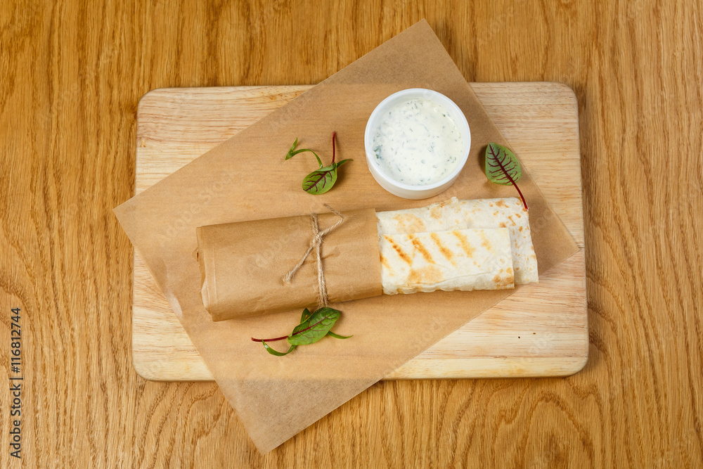 Beautiful meat dish on a wooden background Beautiful meat dish on a wooden background
