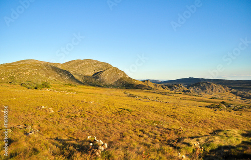 Sunset in a landscape of mountains, Lapinha da Serra, MG, Brazil photo