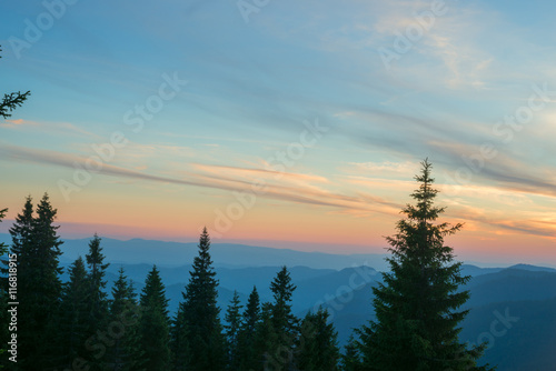 Fototapeta Naklejka Na Ścianę i Meble -  Sunset over the mountain ridge.