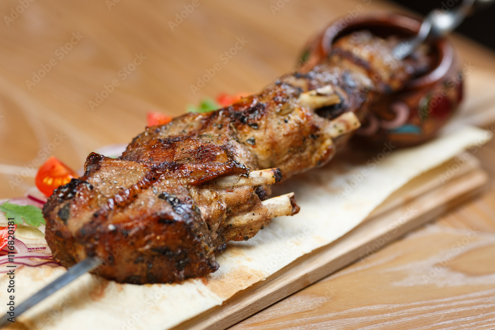 Beautiful meat dish on a wooden background