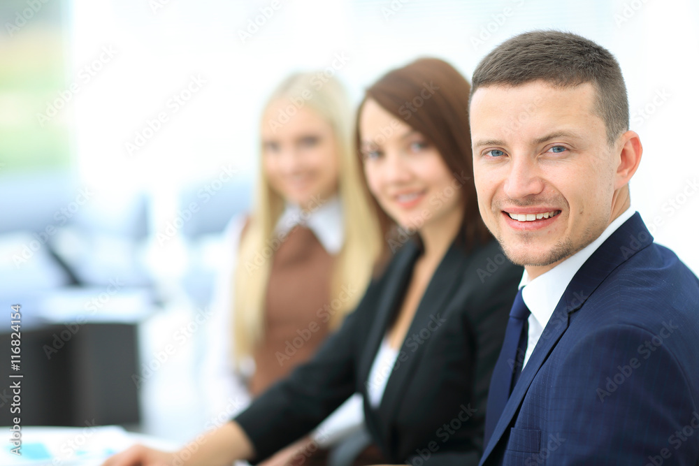 Businesspeople Having Meeting Around Table In Modern Office Businesspeople Having Meeting Around Table In Modern Office