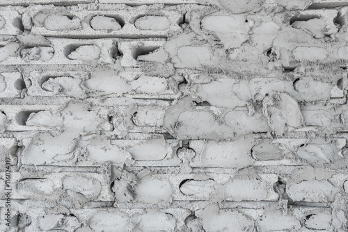 Fotografía uncompleted grey concrete brick wall