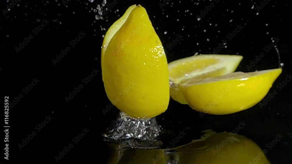 fruit mix composition montage falling splashing on black slow motion