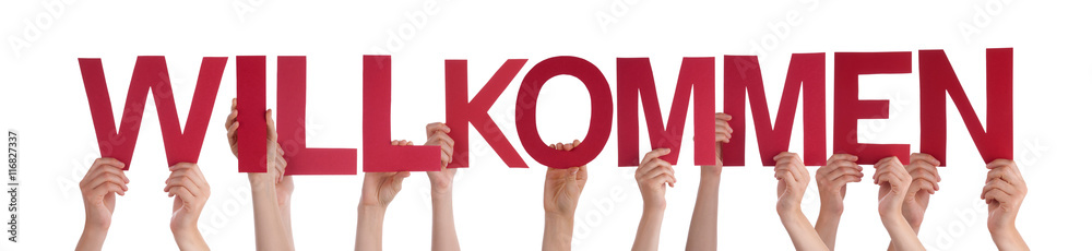 People Holding Straight German Word Willkommen Means Welcome People Holding Straight German Word Willkommen Means Welcome