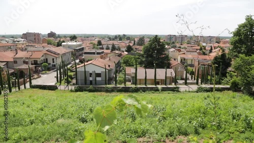 in italy turbigo the cityscape roof and houses from the high plant and tree photo