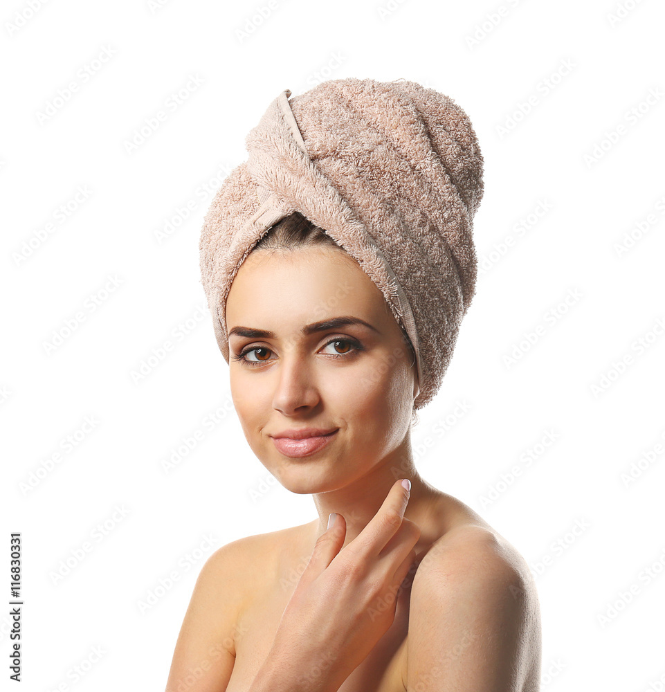 Pretty woman with towel on hair, isolated on white Pretty woman with towel on hair, isolated on white