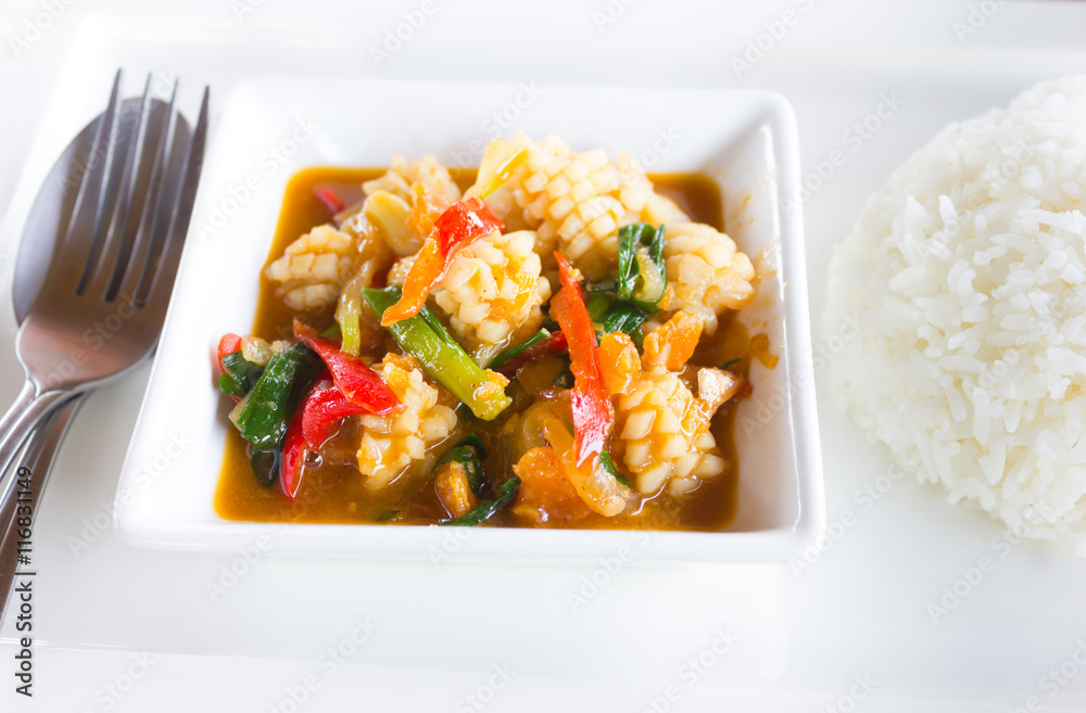 fried squid with salted egg and rice. fried squid with salted egg and rice.